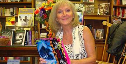 Ann Angel signing