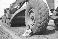 Ann as a Baby with a Tractor